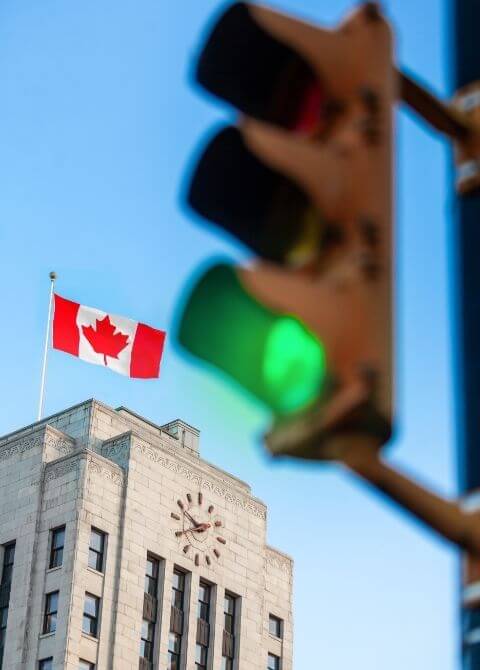 Canadian flag on top of building