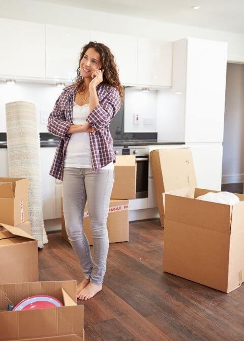 Woman Moving into New Home